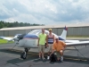 Brandon and Torrey Rueger both Eagle Scouts flying with Sparky the wonder dog in a Cherokee